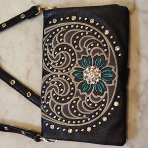 American Bling crossbody clutch purse.